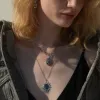 Sun & Moon Black Mother of Pearl Amulet sold by Awe Inspired