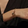 Saturn + Shooting Star Bracelet sold by Awe Inspired
