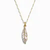 Mother of Pearl Feather White Enamel Necklace sold by Awe Inspired