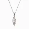 Mother of Pearl Feather White Enamel Necklace sold by Awe Inspired