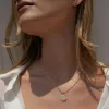 Diamond Spiral Shell Amulet sold by Awe Inspired