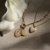 Diamond Spiral Shell Amulet sold by Awe Inspired