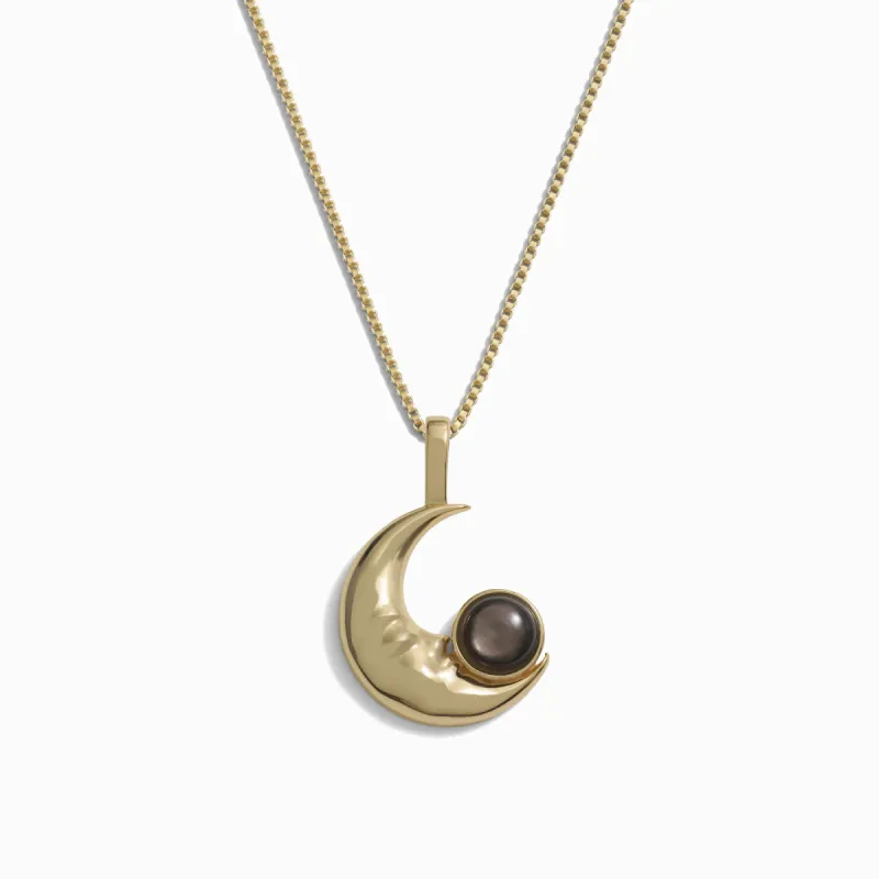 Man in the Moon Black Mother of Pearl Necklace sold by Awe Inspired