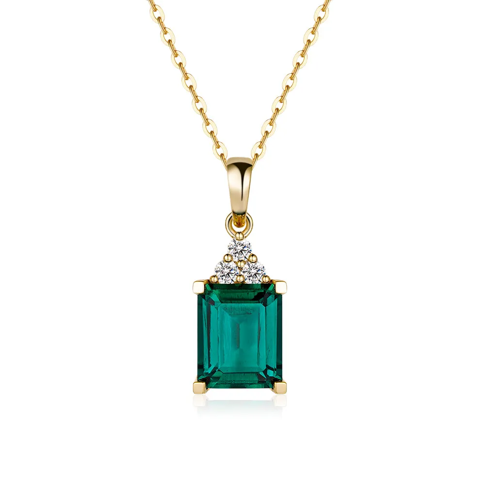 4 CT. Emerald Cut Emerald Pendant With Trio Moissanite Diamonds sold by MSBLUE Jewelry