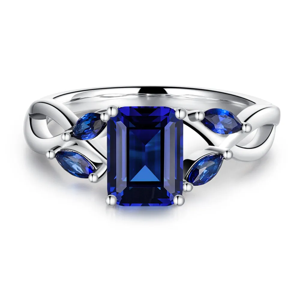 2 CT. Emerald Cut Lab Grown Sapphire Ring with Marquise Sapphire Accents sold by MSBLUE Jewelry