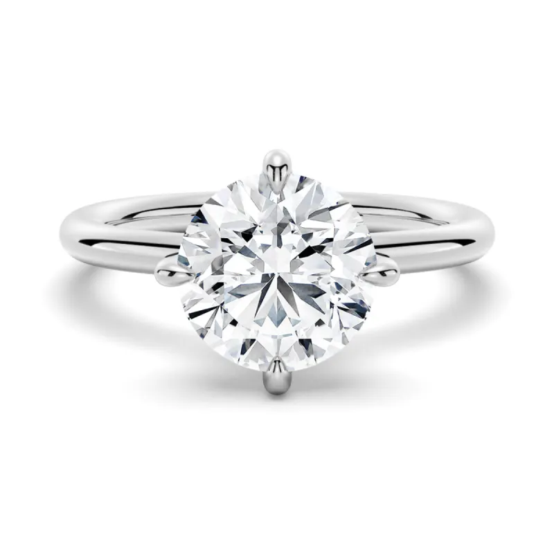 Four-Prong Solitaire Moissanite Engagement Ring sold by MSBLUE Jewelry