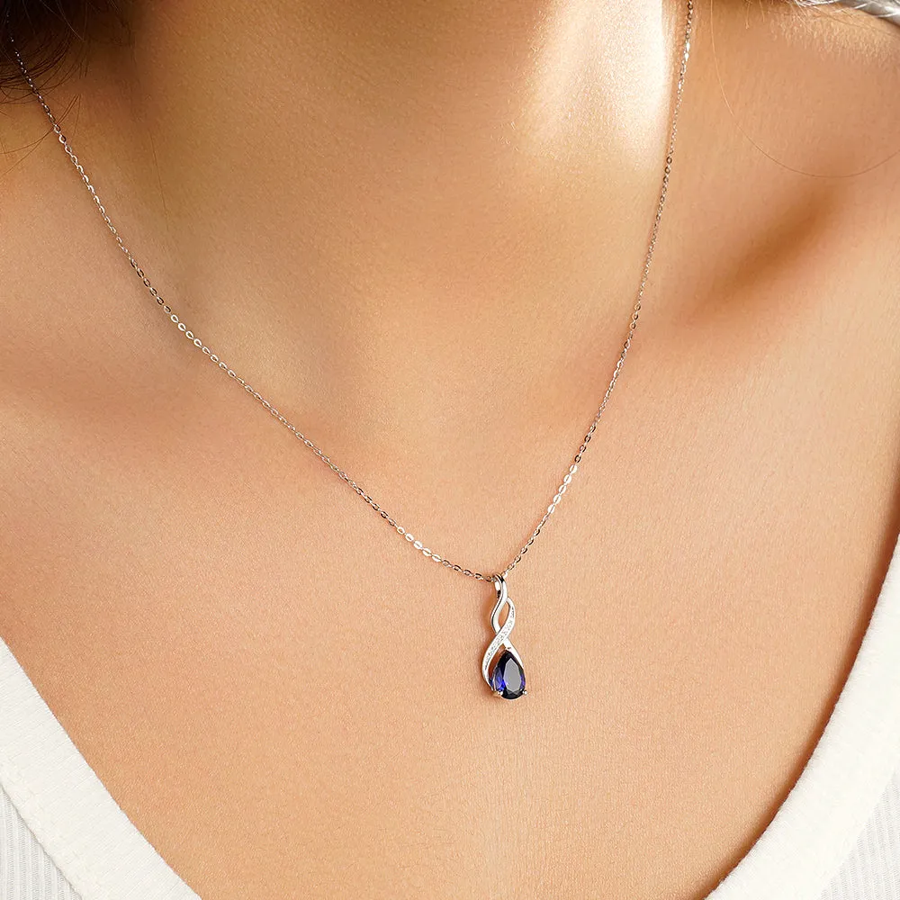 1.56 CT. Blue Sapphire and White Sapphire Infinity Swirl Pendant sold by MSBLUE Jewelry product image thumbnail 5