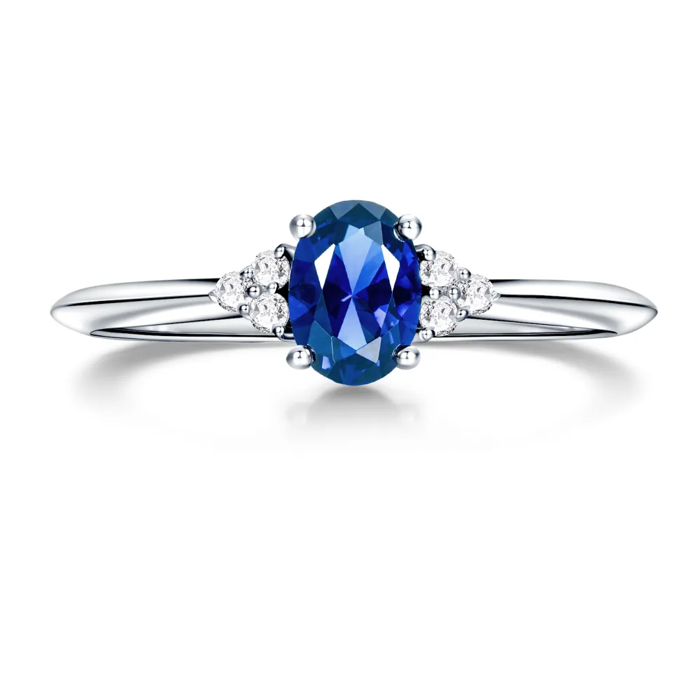 2.5 CT. Oval Sapphire Ring with Trio White Sapphire Accents sold by MSBLUE Jewelry