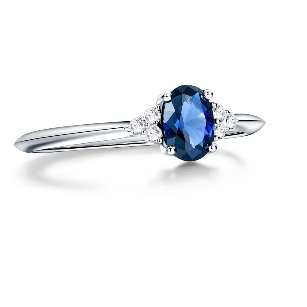 2.5 CT. Oval Sapphire Ring with Trio White Sapphire Accents sold by MSBLUE Jewelry product image thumbnail 2