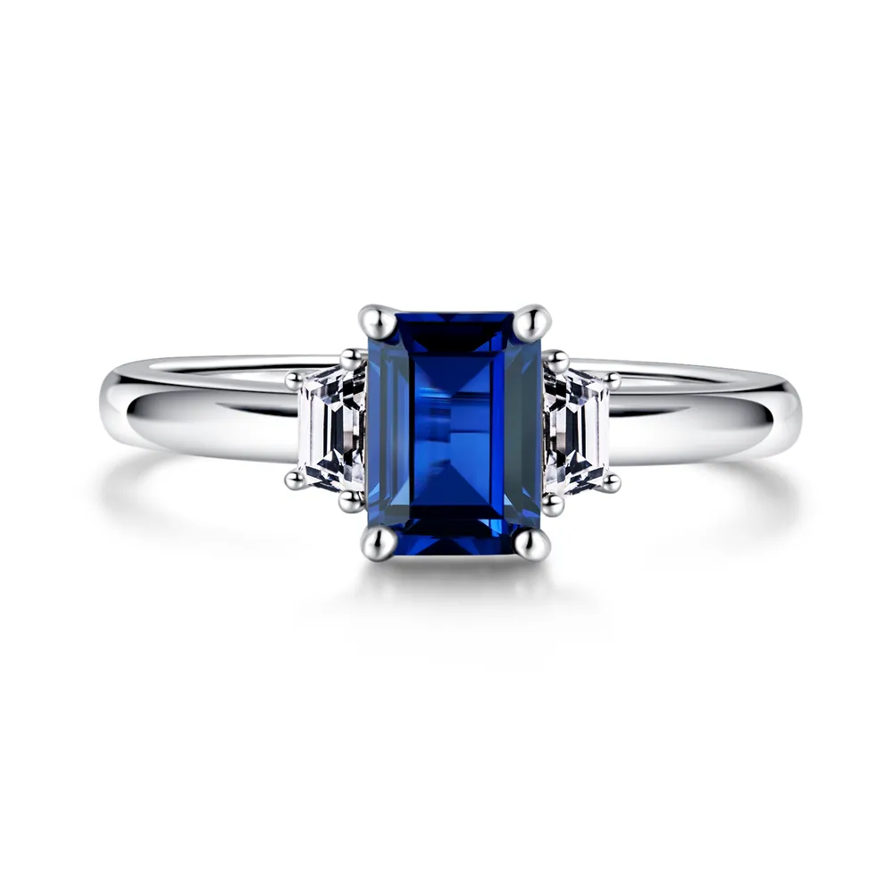Emerald Cut Blue Sapphire and White Sapphire Three Stone Ring sold by MSBLUE Jewelry