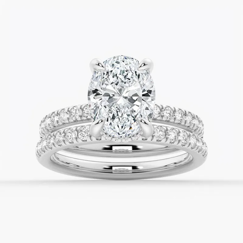 Micropavé Oval Hidden Halo Moissanite Ring Set with Matching Wedding Band sold by MSBLUE Jewelry
