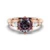 2 CT. Round Cut Alexandrite Engagement Ring With Pear Shaped Moissanite Accents sold by MSBLUE Jewelry
