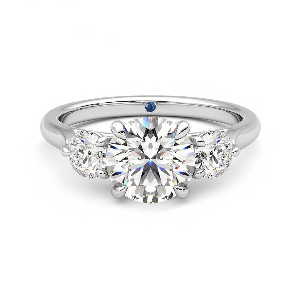 Four Prong Three Stone Round Moissanite Engagement Ring with Hidden Anniversary Stone Accent sold by MSBLUE Jewelry