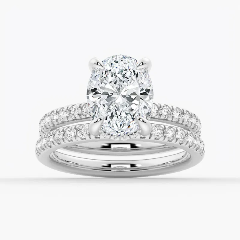 Micropavé Oval Hidden Halo Moissanite Ring Set with Matching Wedding Band sold by MSBLUE Jewelry