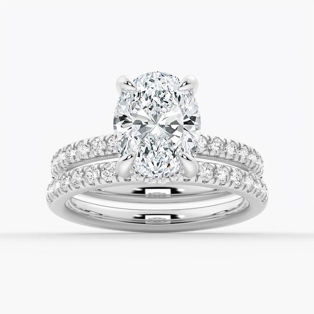 Micropavé Oval Hidden Halo Moissanite Ring Set with Matching Wedding Band sold by MSBLUE Jewelry