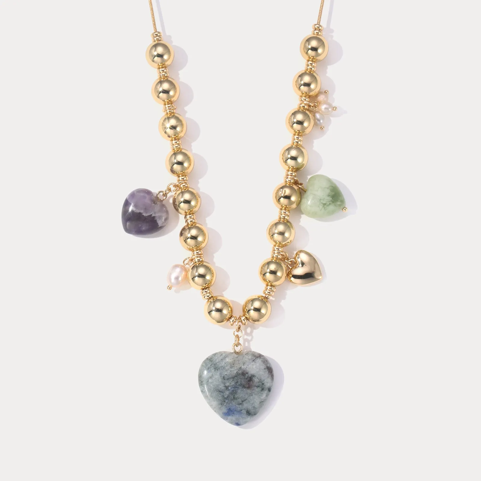 Natural Stone Heart Necklace with Pearl sold by Selenichast