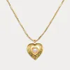 Gold Heart Locket Necklace sold by Selenichast