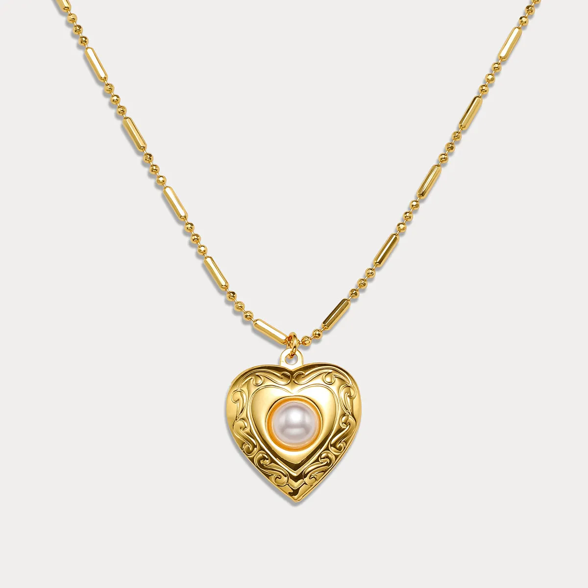 Gold Heart Locket Necklace sold by Selenichast