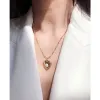 Gold Heart Locket Necklace sold by Selenichast