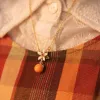 Orange Necklace sold by Selenichast