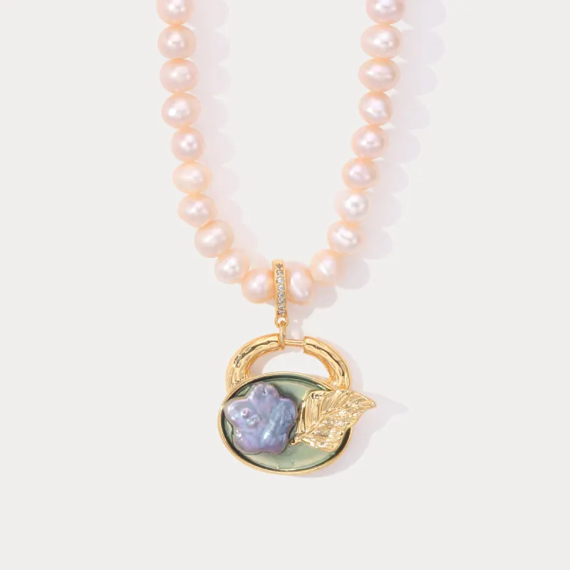 Pearl Necklace with Leaf and Flower sold by Selenichast