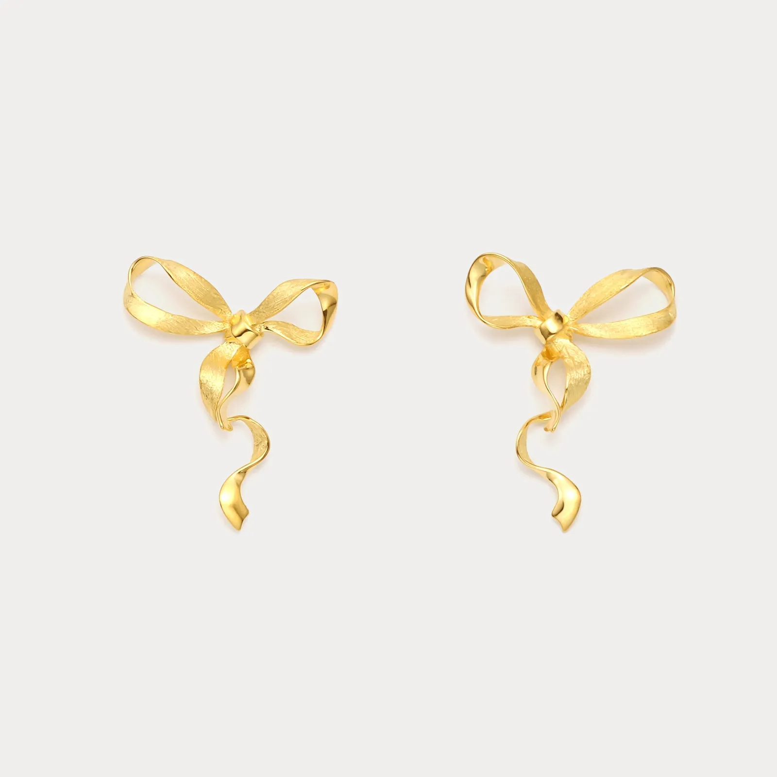 Gold Bow Earrings sold by Selenichast