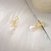 Pearl Bow Earrings sold by Selenichast