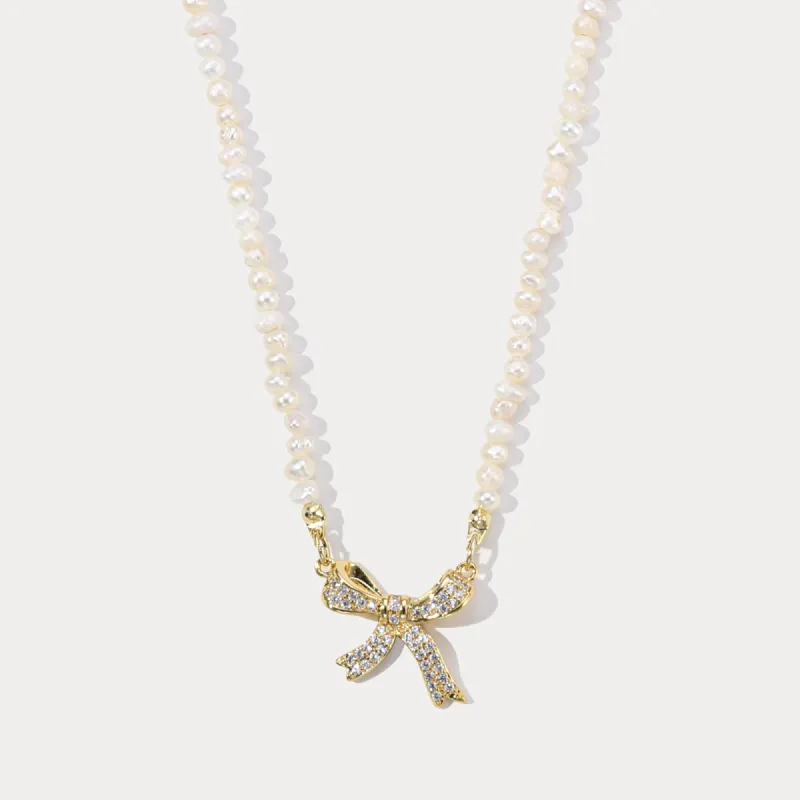 Bow Charm Freshwater Pearl Necklace sold by Selenichast