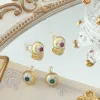 Emerald Flower Earrings sold by Selenichast