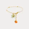 Orange Flower Pearl Bracelet sold by Selenichast
