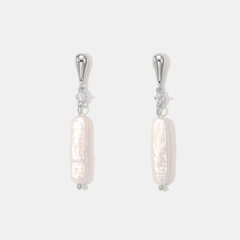 Long Baroque Pearl Earrings sold by Selenichast