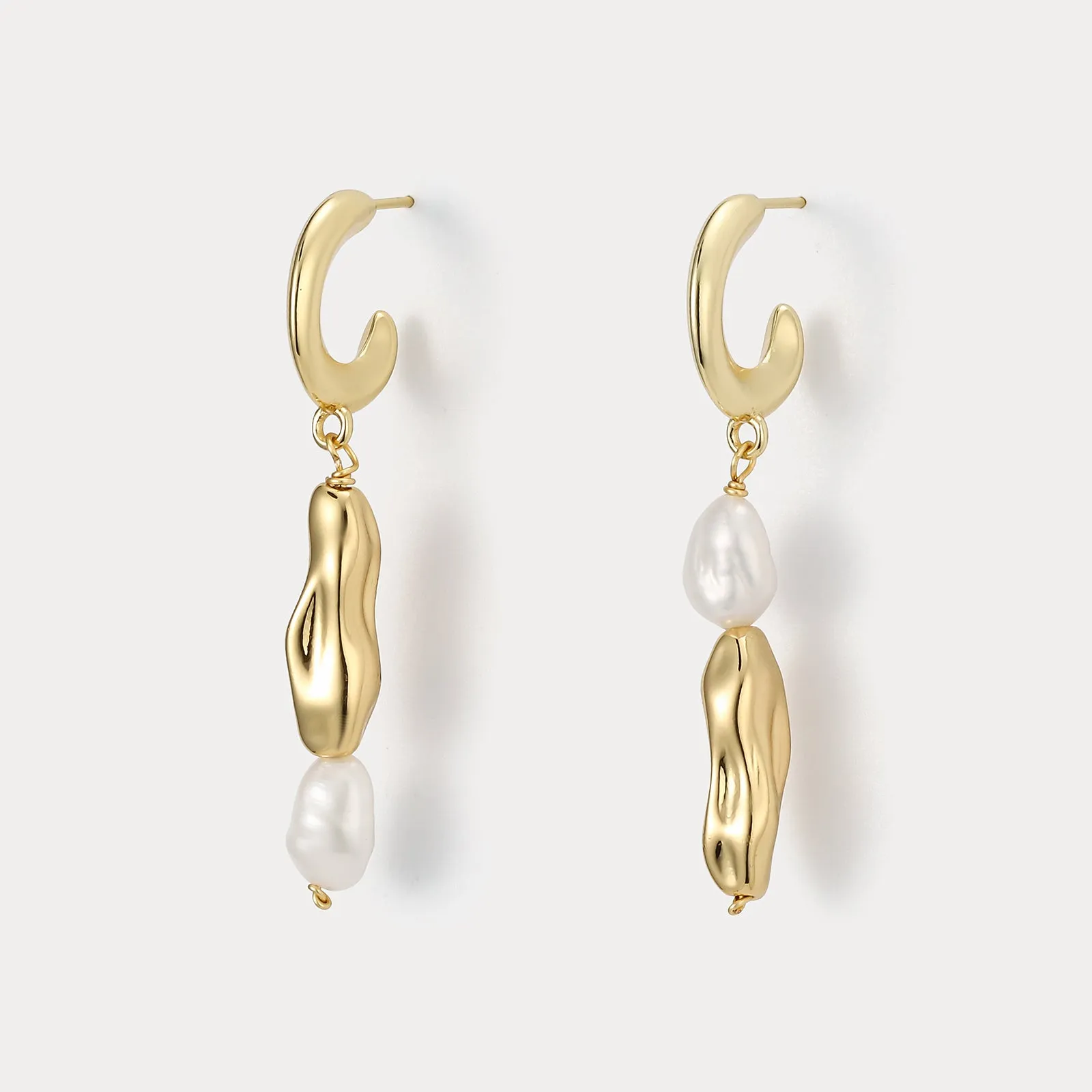 Sculptural Pearl Earrings sold by Selenichast