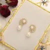 Shell Pearl Earrings sold by Selenichast