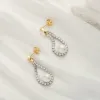 Moon Star Pearl Earrings sold by Selenichast