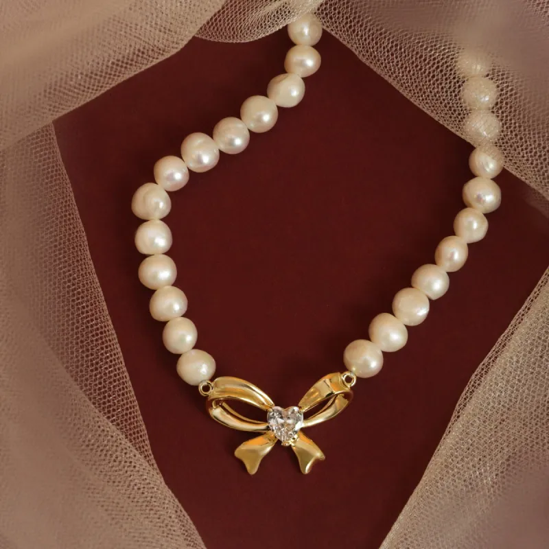 Pearl Bow Necklace sold by Selenichast