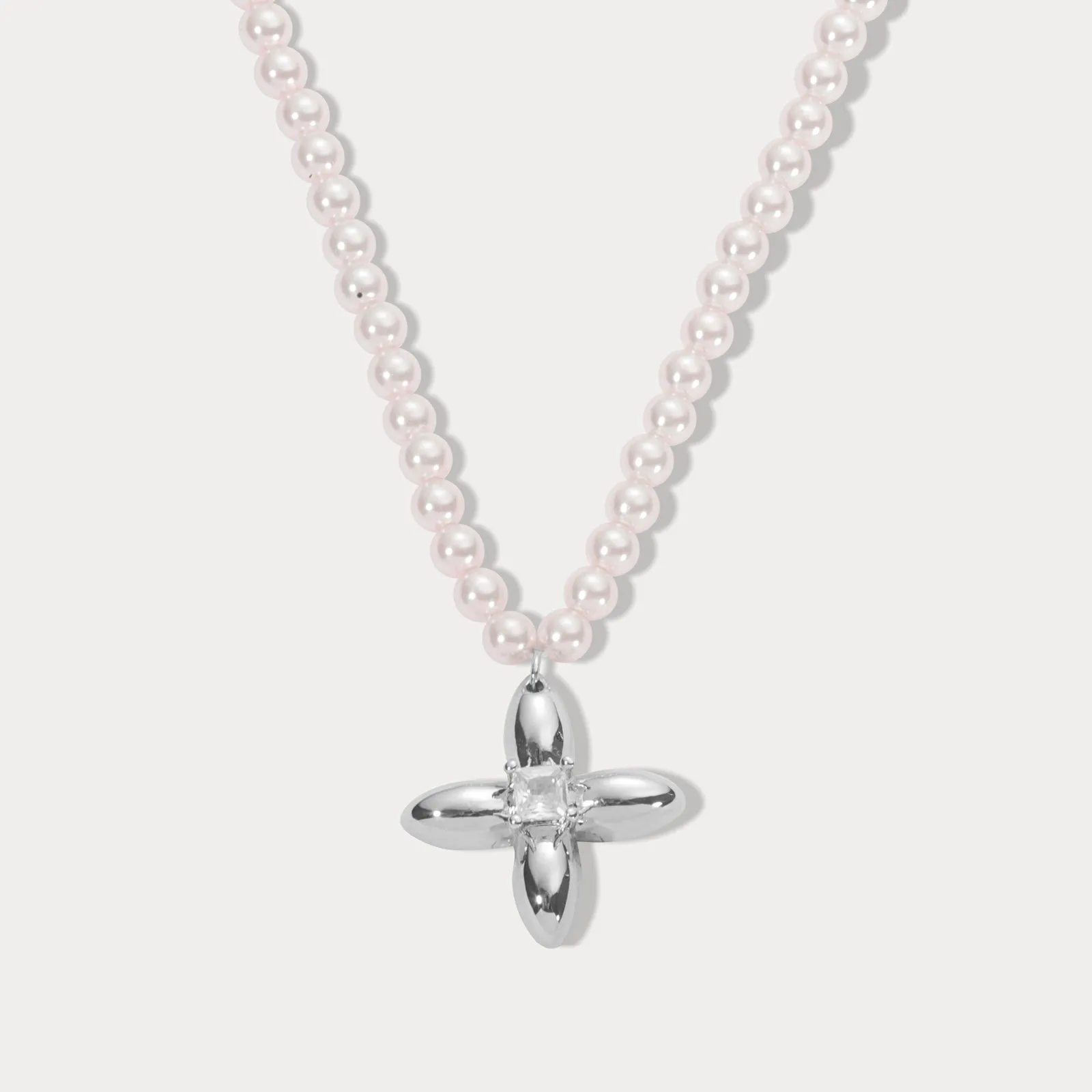 Pearl Cross Necklace sold by Selenichast