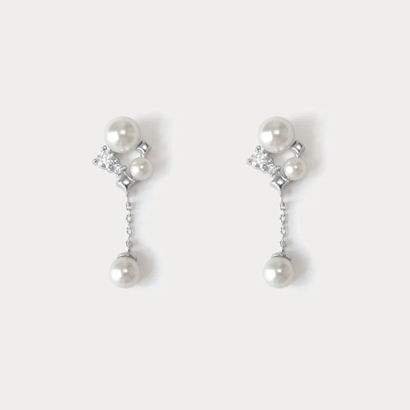 Silver Star Pearl Earrings sold by Selenichast