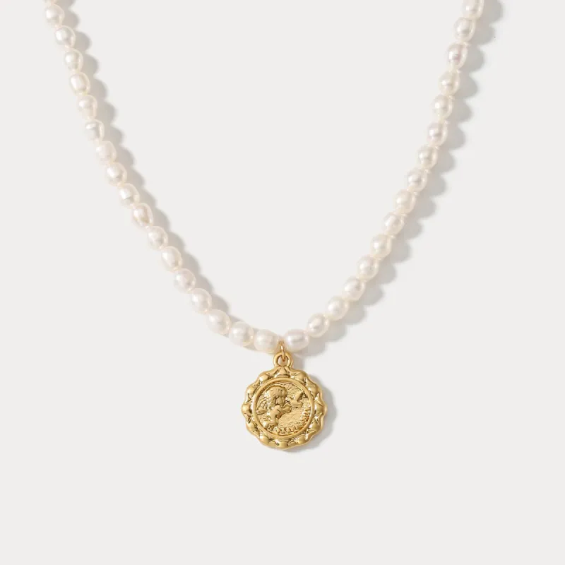 Cupid Pearl Necklace sold by Selenichast