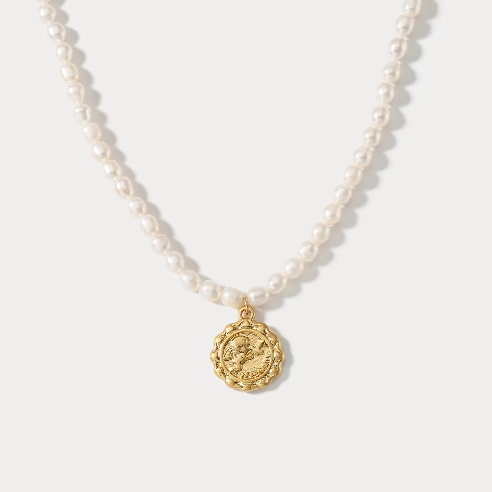 Cupid Pearl Necklace sold by Selenichast