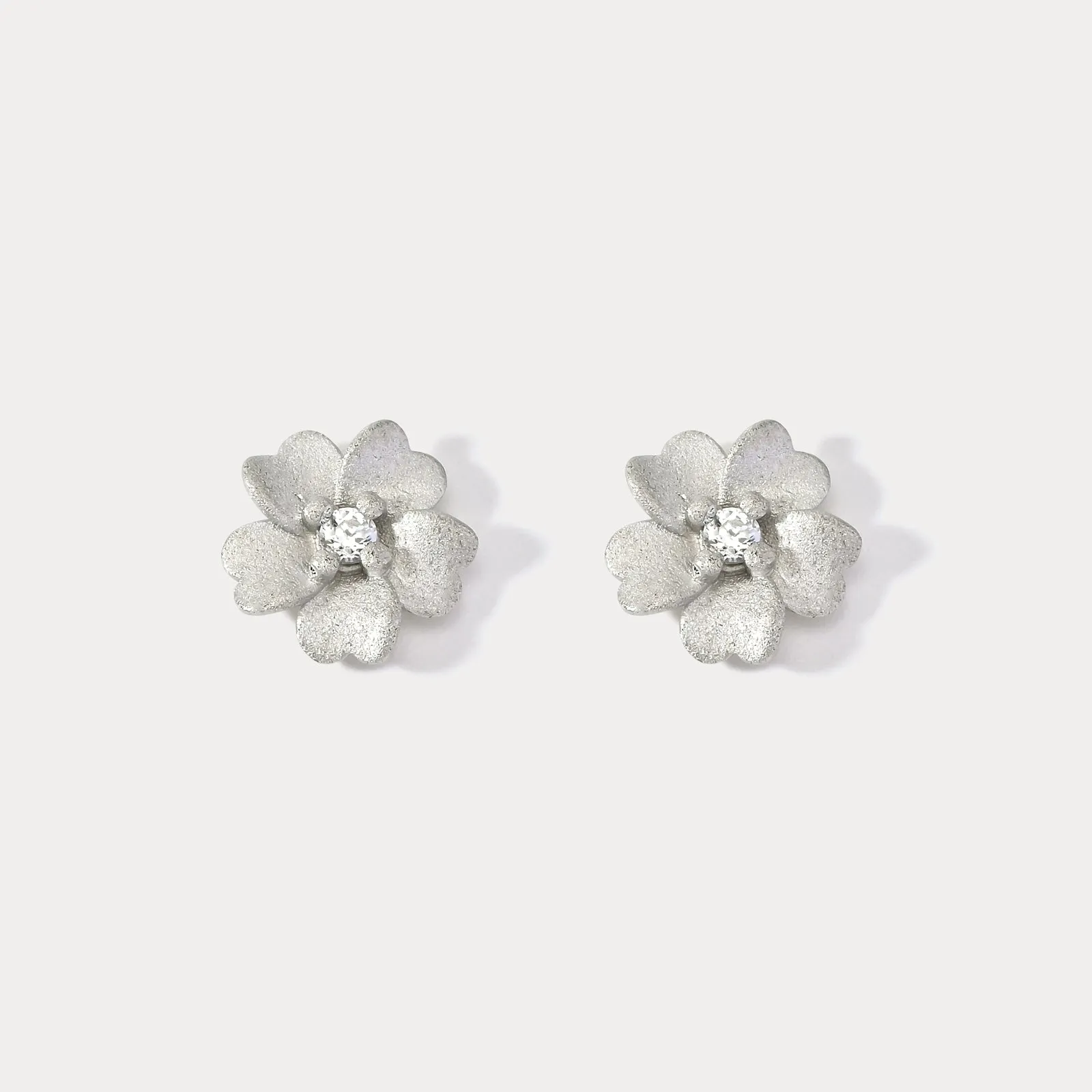 Silver Flower Stud Earrings sold by Selenichast