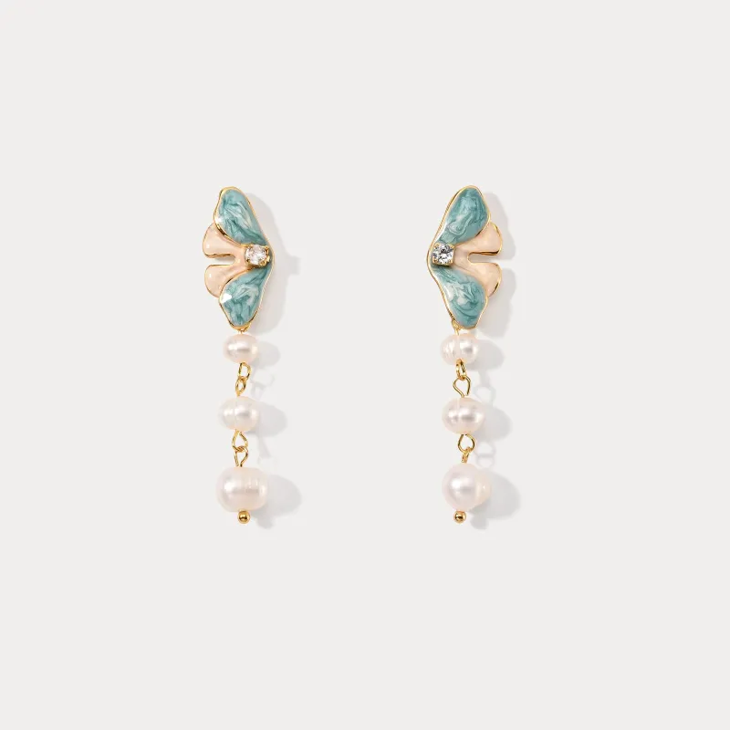 Butterfly Pearl Dangling Earrings sold by Selenichast