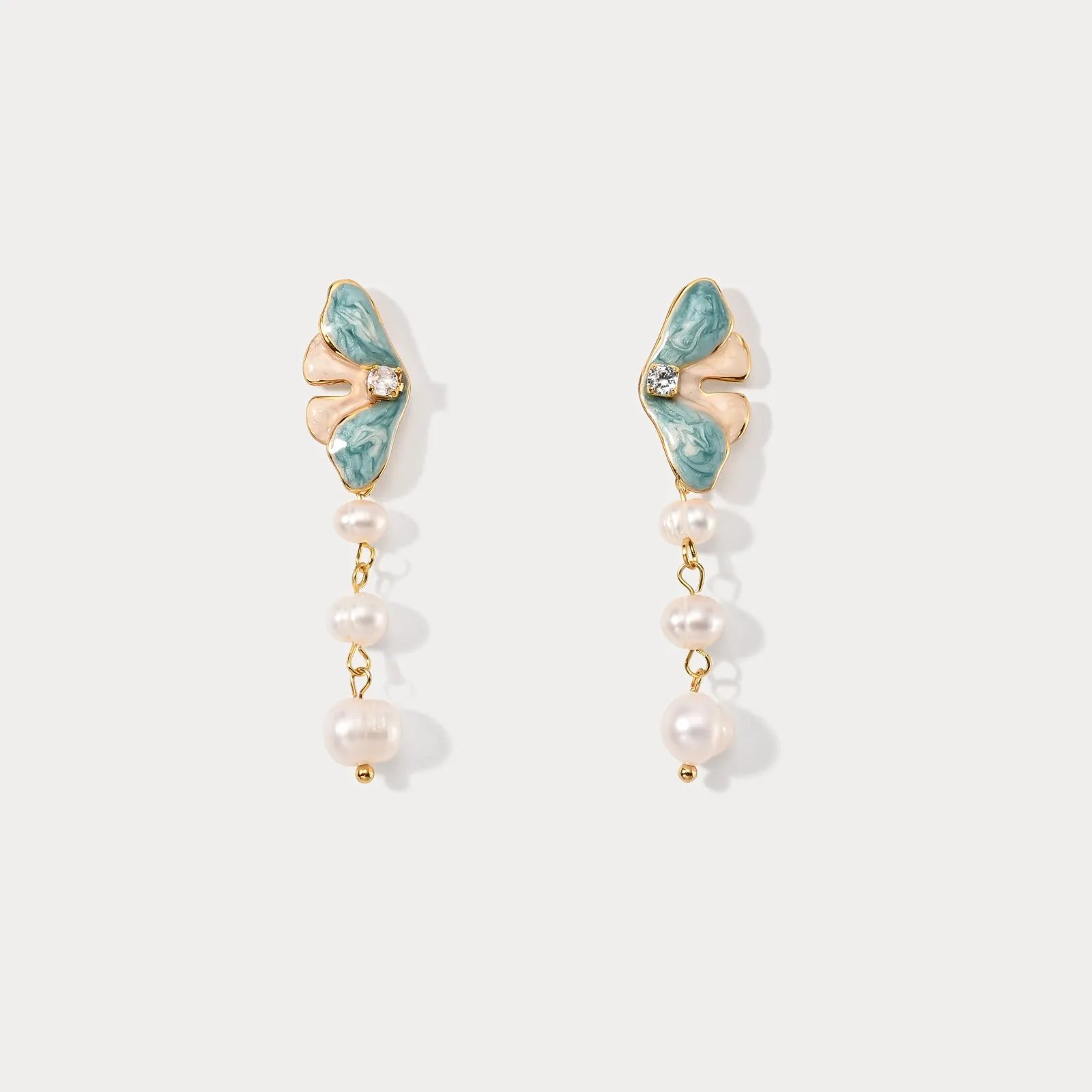 Butterfly Pearl Dangling Earrings sold by Selenichast