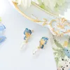 Butterfly Pearl Dangling Earrings sold by Selenichast