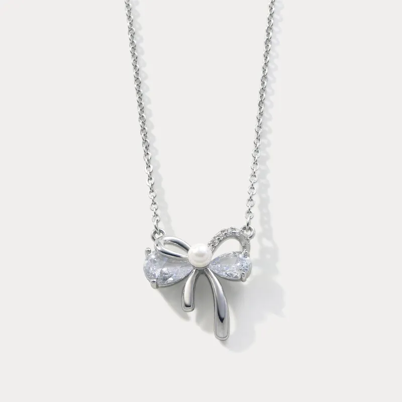 Silver Bow Necklace sold by Selenichast