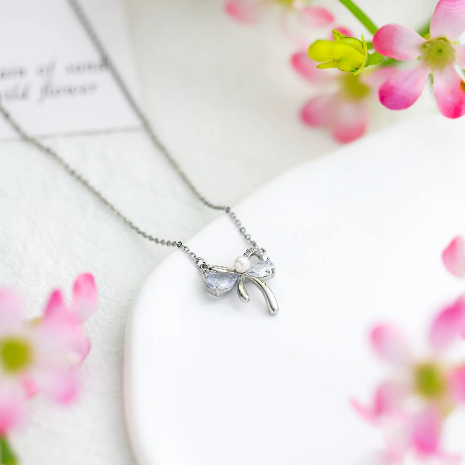Silver Bow Necklace sold by Selenichast product image thumbnail 4