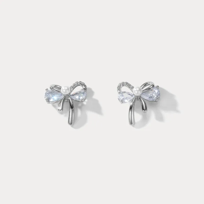 Silver Bow Earrings sold by Selenichast