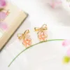 Sakura Bow Earrings sold by Selenichast