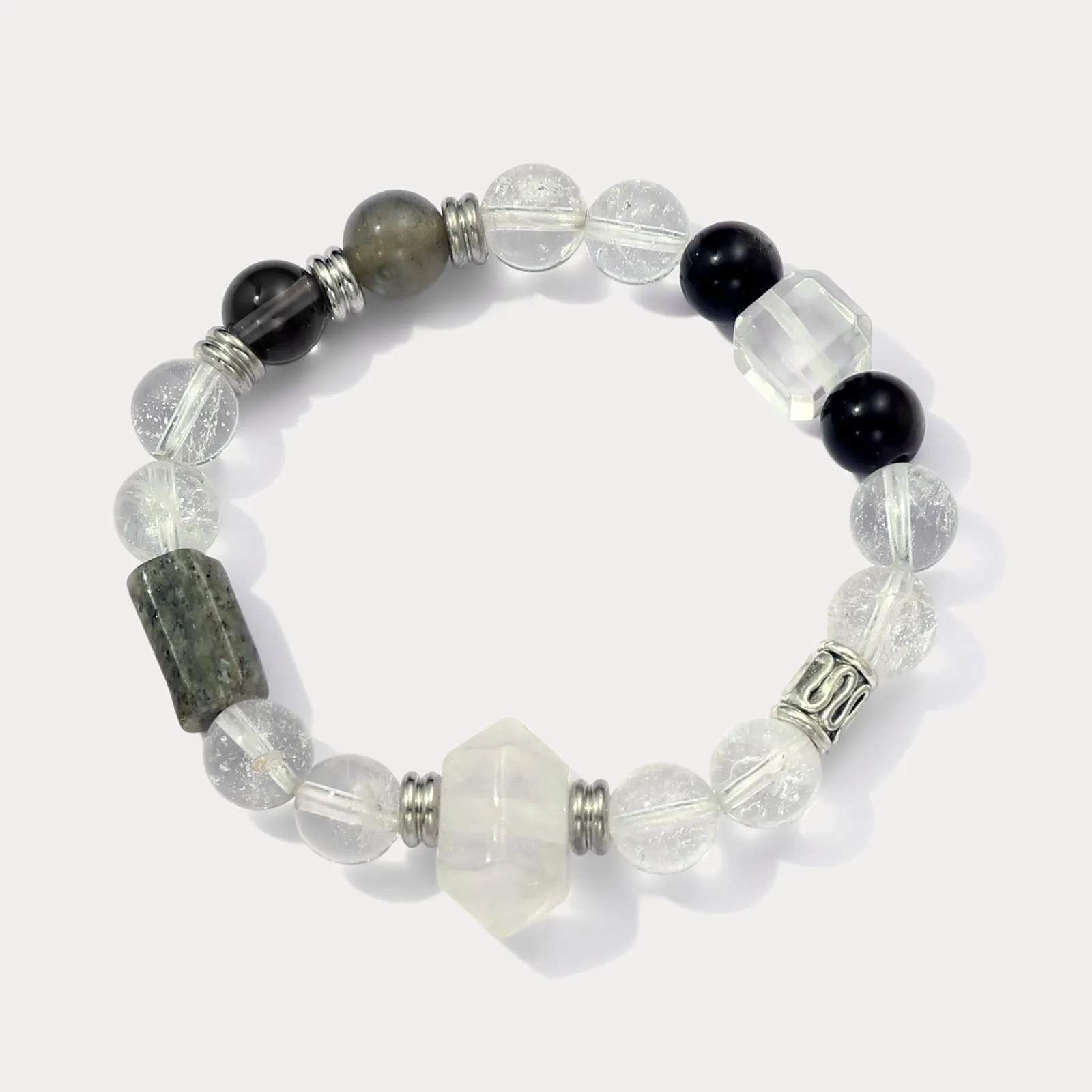 Obsidian and Clear Quartz Bracelet sold by Selenichast