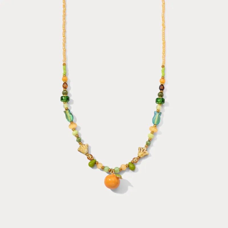Orange Beaded Necklace sold by Selenichast