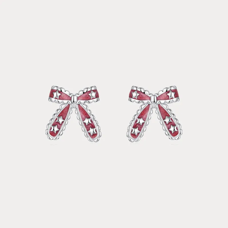 Christmas Bow Star Earrings sold by Selenichast
